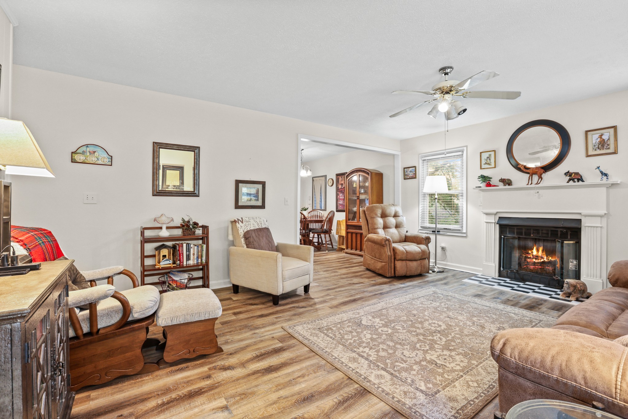 236 Old Columbia Road Dickson, TN 37055 - Photo 6 of 26 a living room with furniture and a fireplace