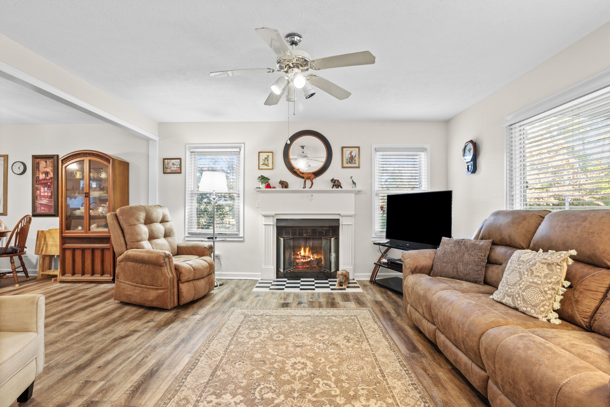 236 Old Columbia Road Dickson, TN 37055 - Photo 7 of 26 a living room with furniture a fireplace and a large window