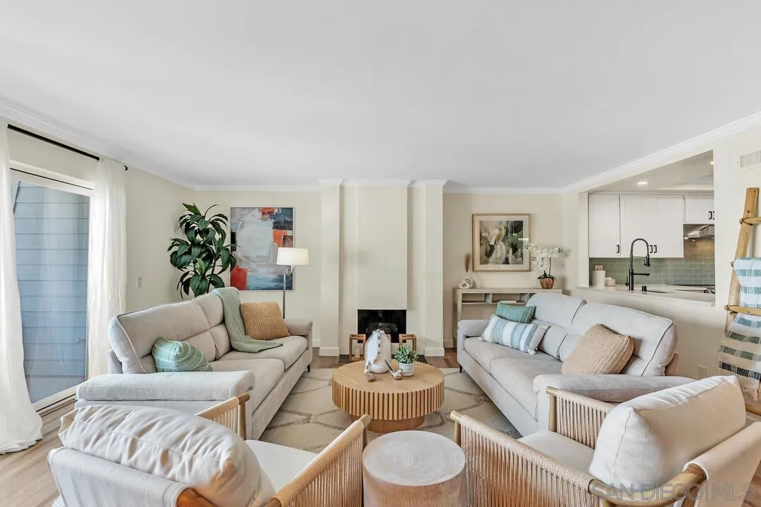 24 Montego Court Coronado, CA 92118 - Photo 21 of 71 a living room with furniture and a fireplace
