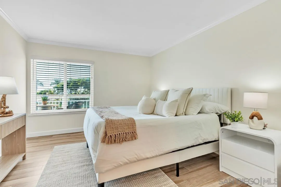 24 Montego Court Coronado, CA 92118 - Photo 23 of 71 a bedroom with a bed a dresser and next to a window