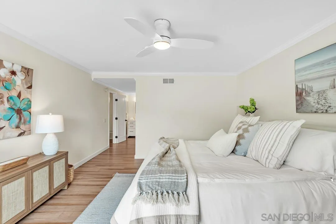 24 Montego Court Coronado, CA 92118 - Photo 30 of 71 a bedroom with a bed and a couch