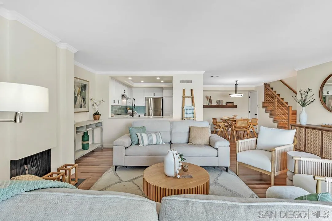 24 Montego Court Coronado, CA 92118 - Photo 3 of 71 a living room with furniture and a fireplace