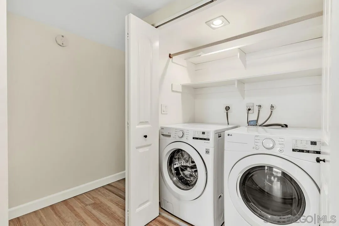 24 Montego Court Coronado, CA 92118 - Photo 37 of 71 a view of a hallway with washer and dryer