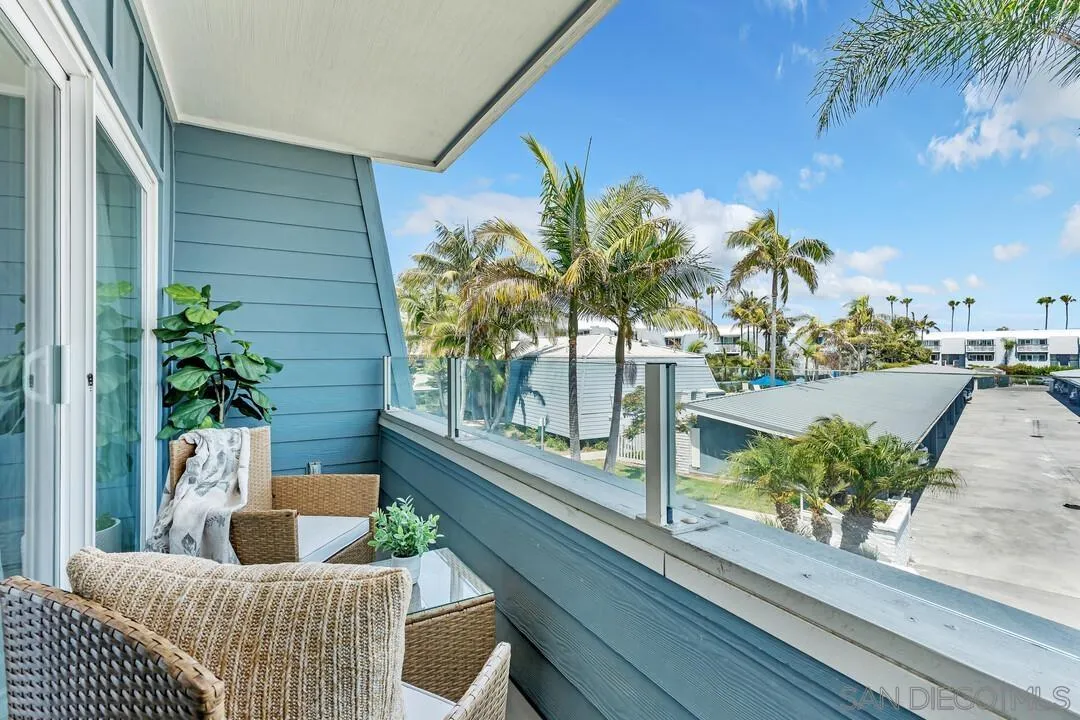 24 Montego Court Coronado, CA 92118 - Photo 48 of 71 a view of a balcony with chairs and a potted plant