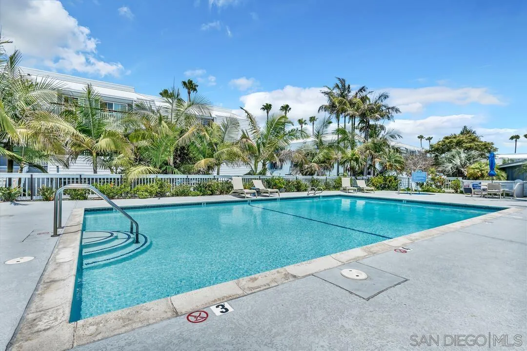 24 Montego Court Coronado, CA 92118 - Photo 50 of 71 a view of a swimming pool with a yard