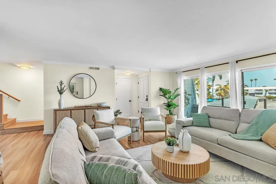 24 Montego Court Coronado, CA 92118 - Photo 5 of 71 a living room with furniture and a large window