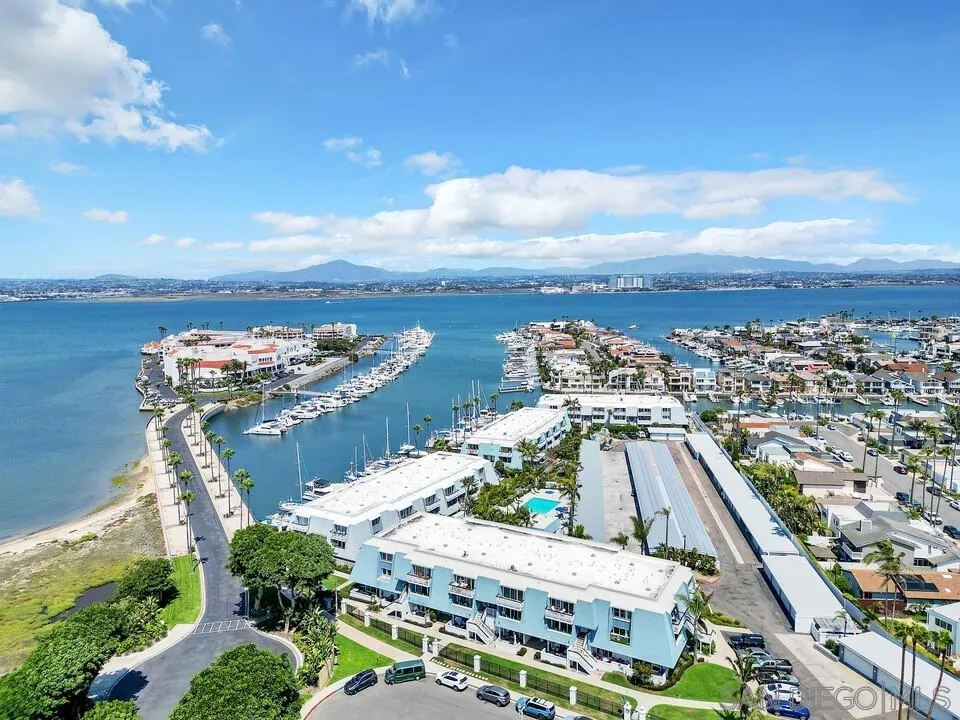 24 Montego Court Coronado, CA 92118 - Photo 53 of 71 a view of a city with lawn chairs and ocean view