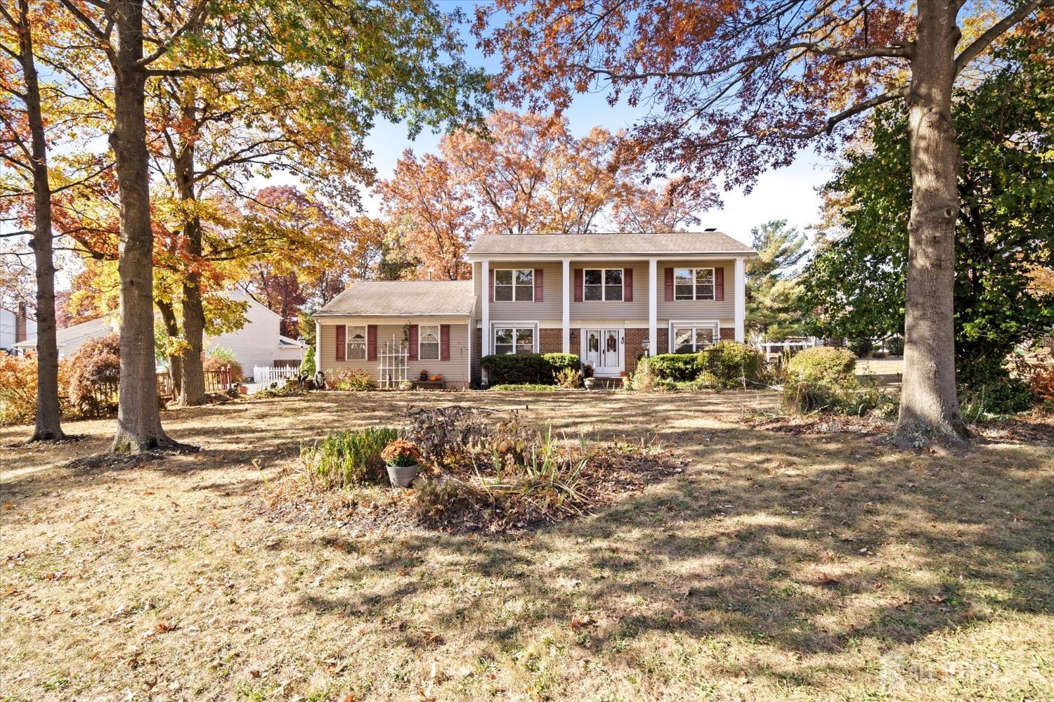 40 Pinecrest Road Somerset, NJ 08873 - Photo 1 of 34 a front view of a house with a yard