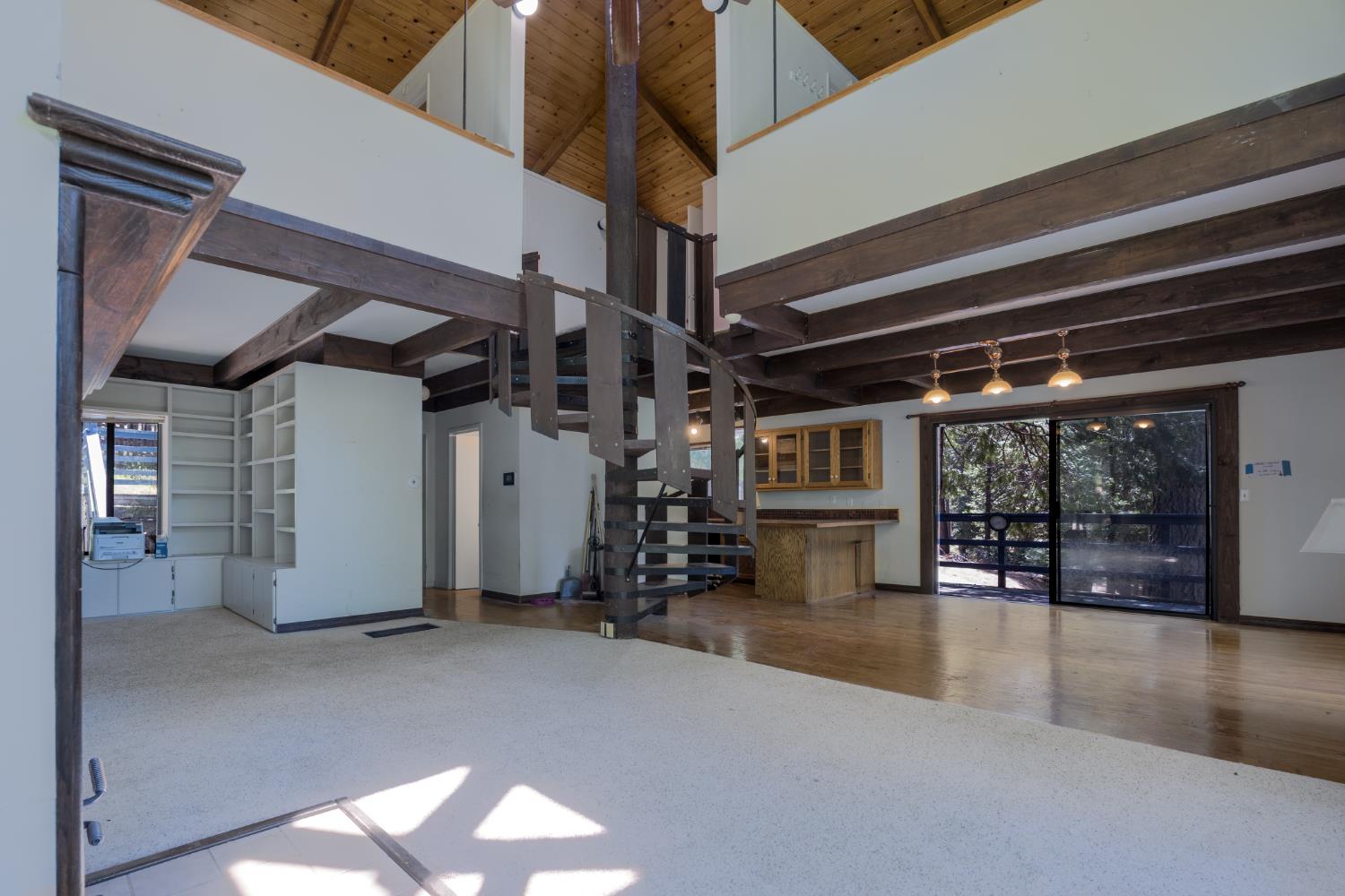 2070 King Of The Mountain Road Pollock Pines, CA 95726 - Photo 6 of 53 a view of empty room with wooden floor