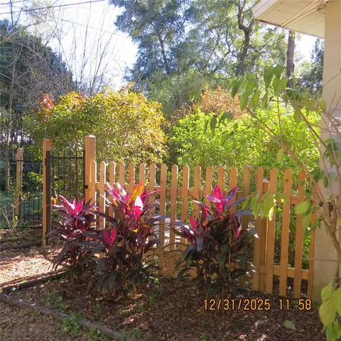 a view of a flowers in front of a house