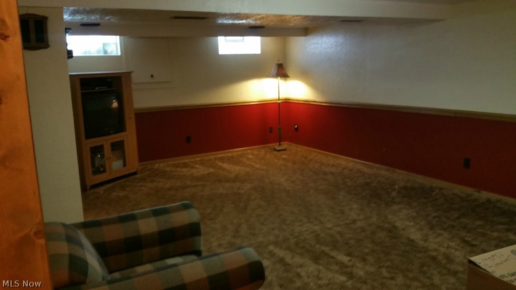 1817 Lake Heights Road Northwest Canton, OH 44708 - Photo 18 of 25 DOWNSTAIRS FAMILY ROOM/MAN CAVE
