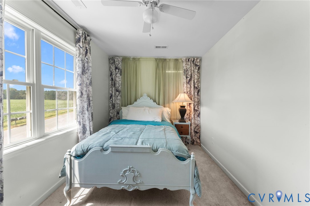 110 Hampton Road Dunnsville, VA 22454 - Photo 24 of 40 a view of a livingroom with furniture