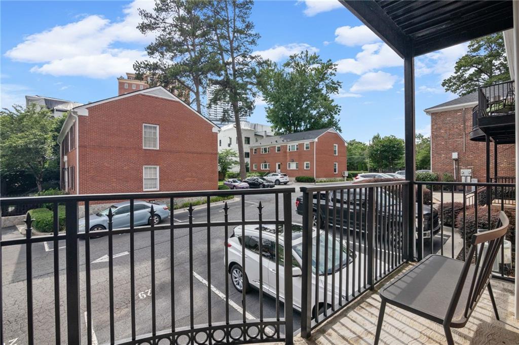 3675 Peachtree Road Northeast, Unit 45 Atlanta, GA 30319 - Photo 30 of 42 a view of a brick building from a balcony