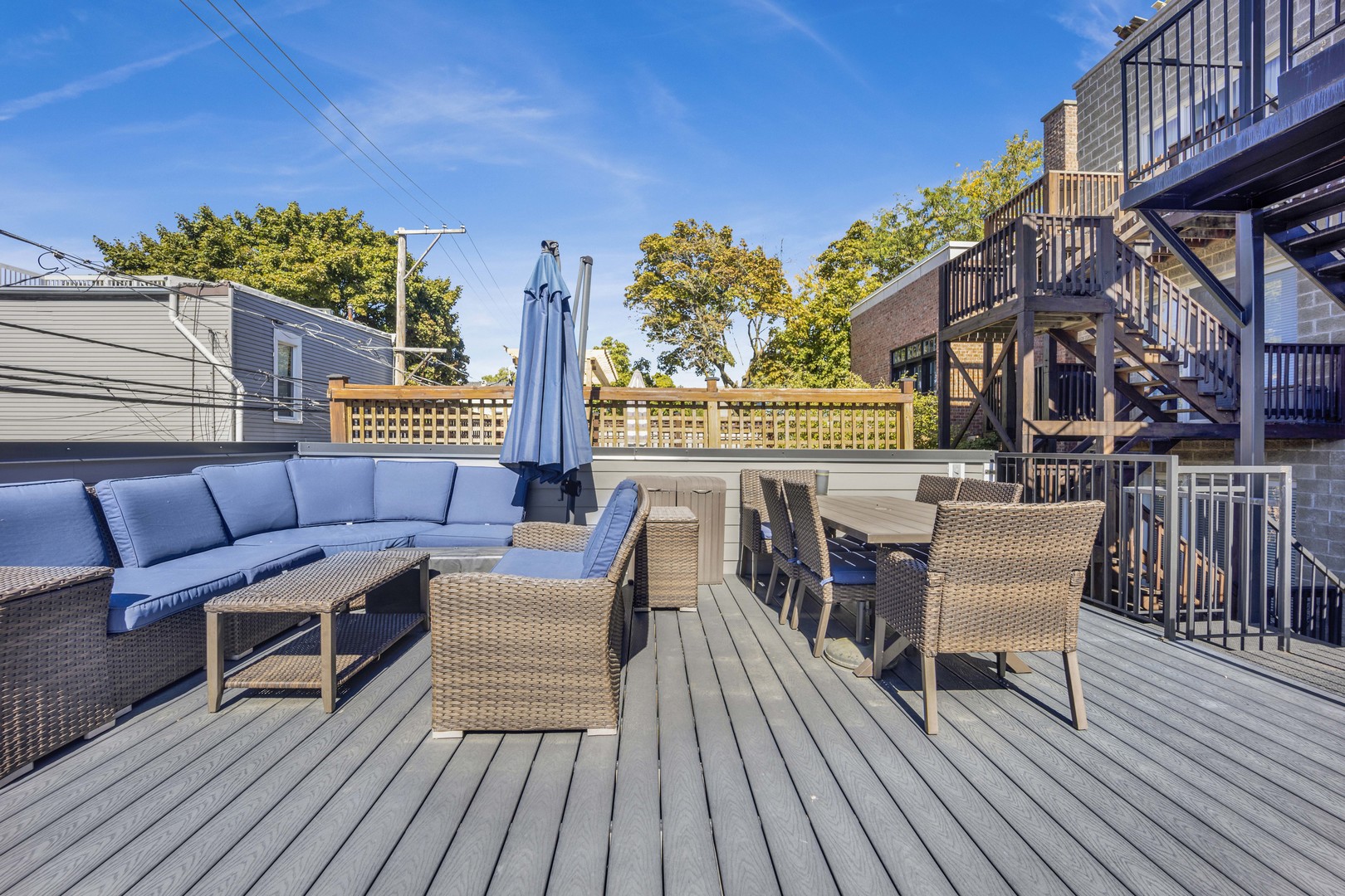 2652 North Racine Avenue, Unit 2 Chicago, IL 60614 - Photo 15 of 17 a balcony with wooden floor table and chairs