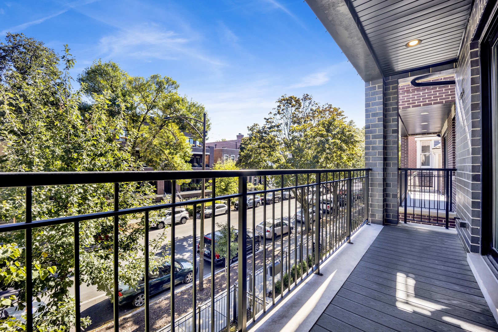 2652 North Racine Avenue, Unit 2 Chicago, IL 60614 - Photo 7 of 17 a view of a balcony with wooden floor