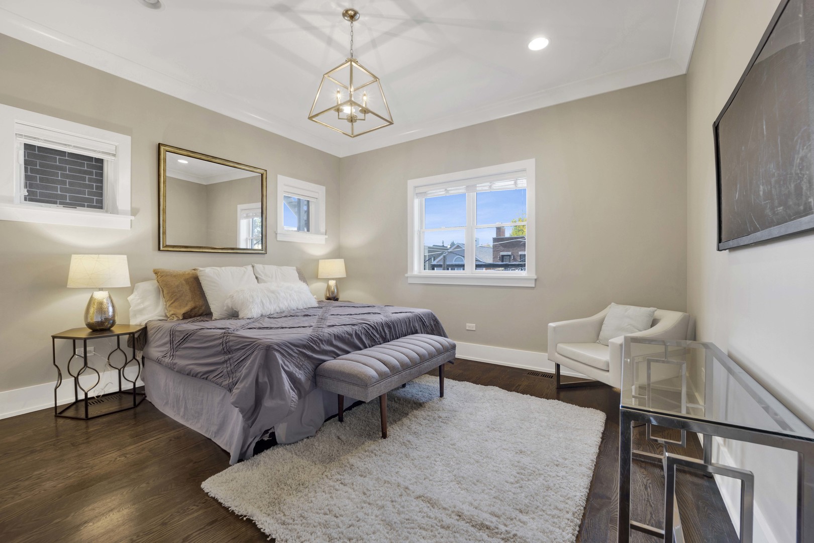 2652 North Racine Avenue, Unit 2 Chicago, IL 60614 - Photo 8 of 17 a spacious bedroom with a bed and a couch
