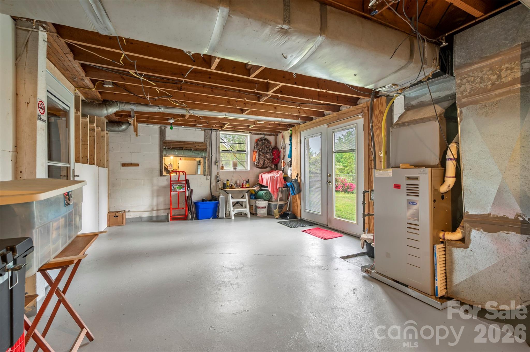4665 Highway 9 Mill Spring, NC 28756 - Photo 25 of 46 a view of a storage room with furniture and a window