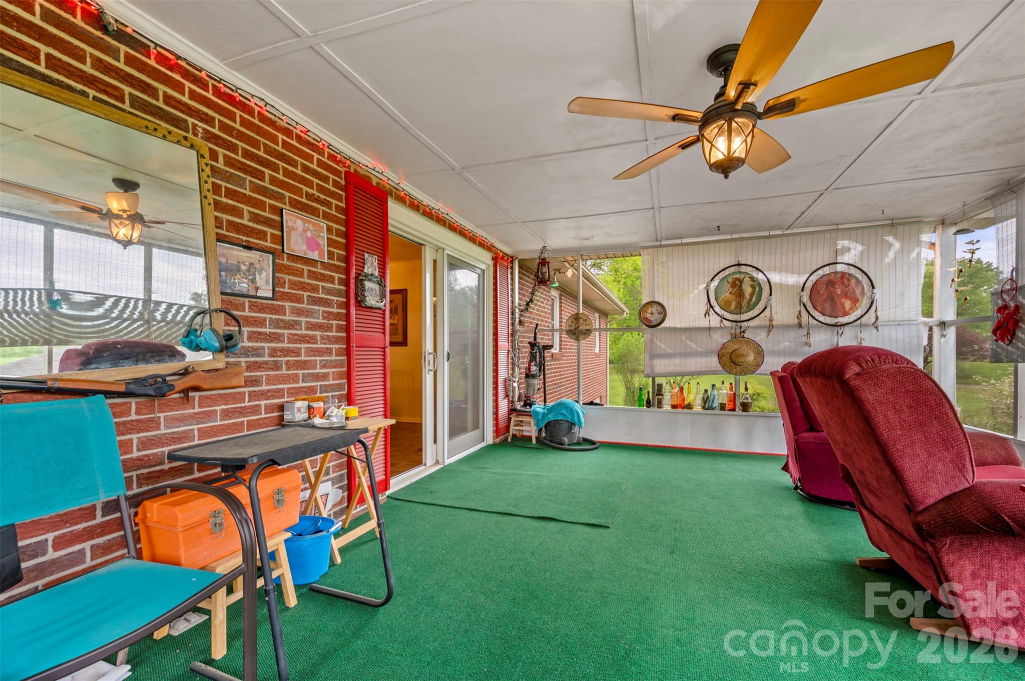 4665 Highway 9 Mill Spring, NC 28756 - Photo 30 of 46 a view of an chairs and table in a backyard