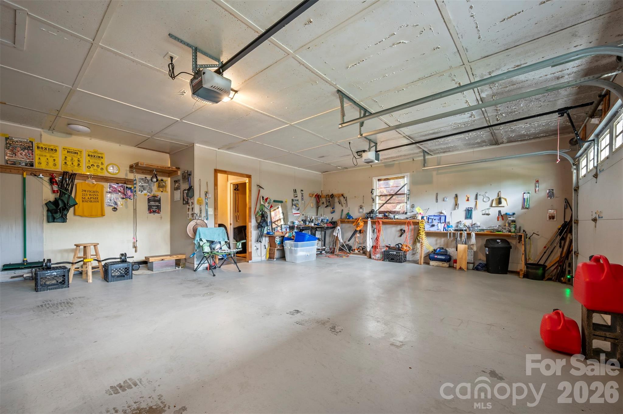 4665 Highway 9 Mill Spring, NC 28756 - Photo 32 of 46 a view of a garage with parked cars