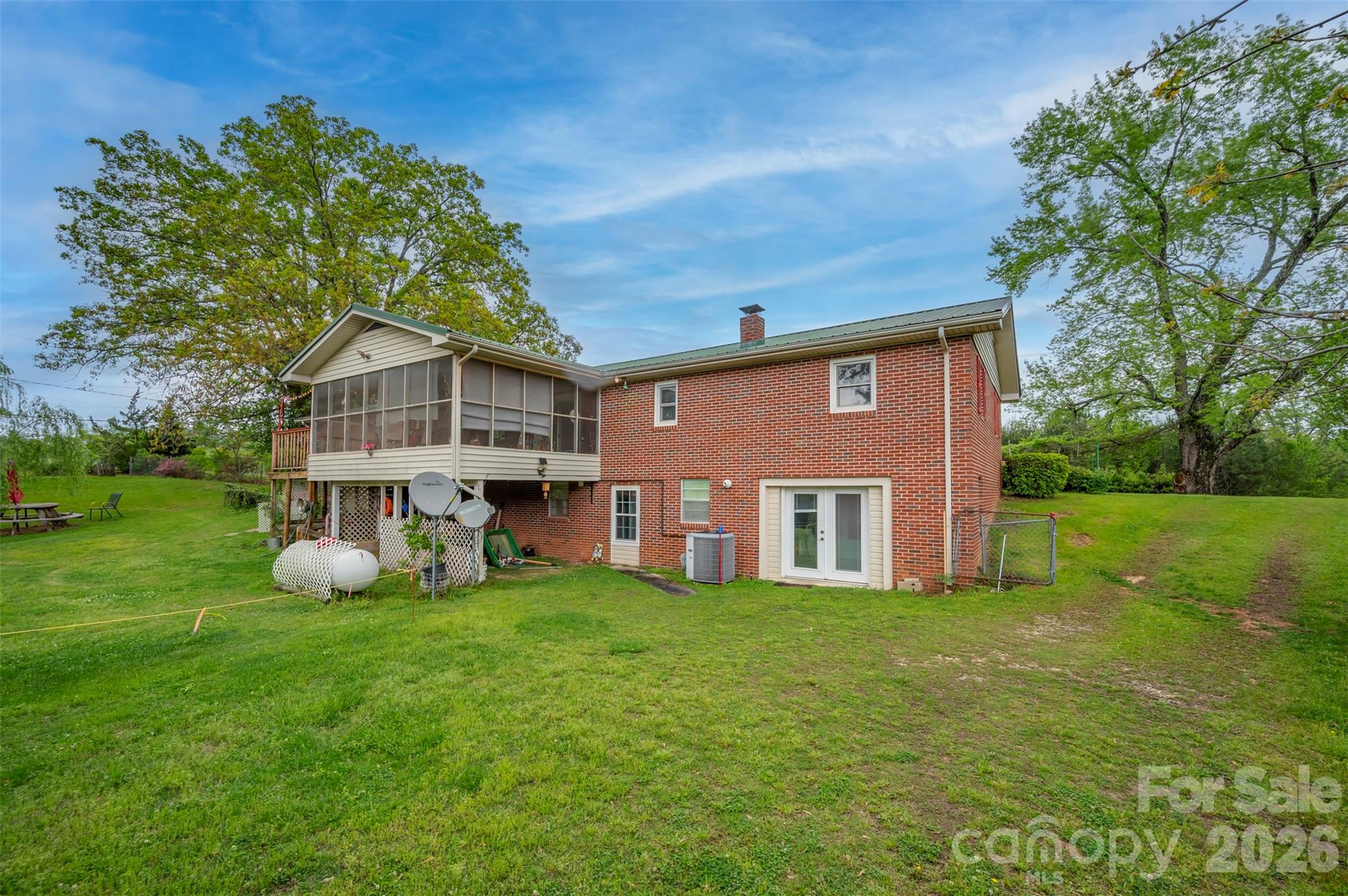 4665 Highway 9 Mill Spring, NC 28756 - Photo 42 of 46 a view of a house with a yard porch and sitting area