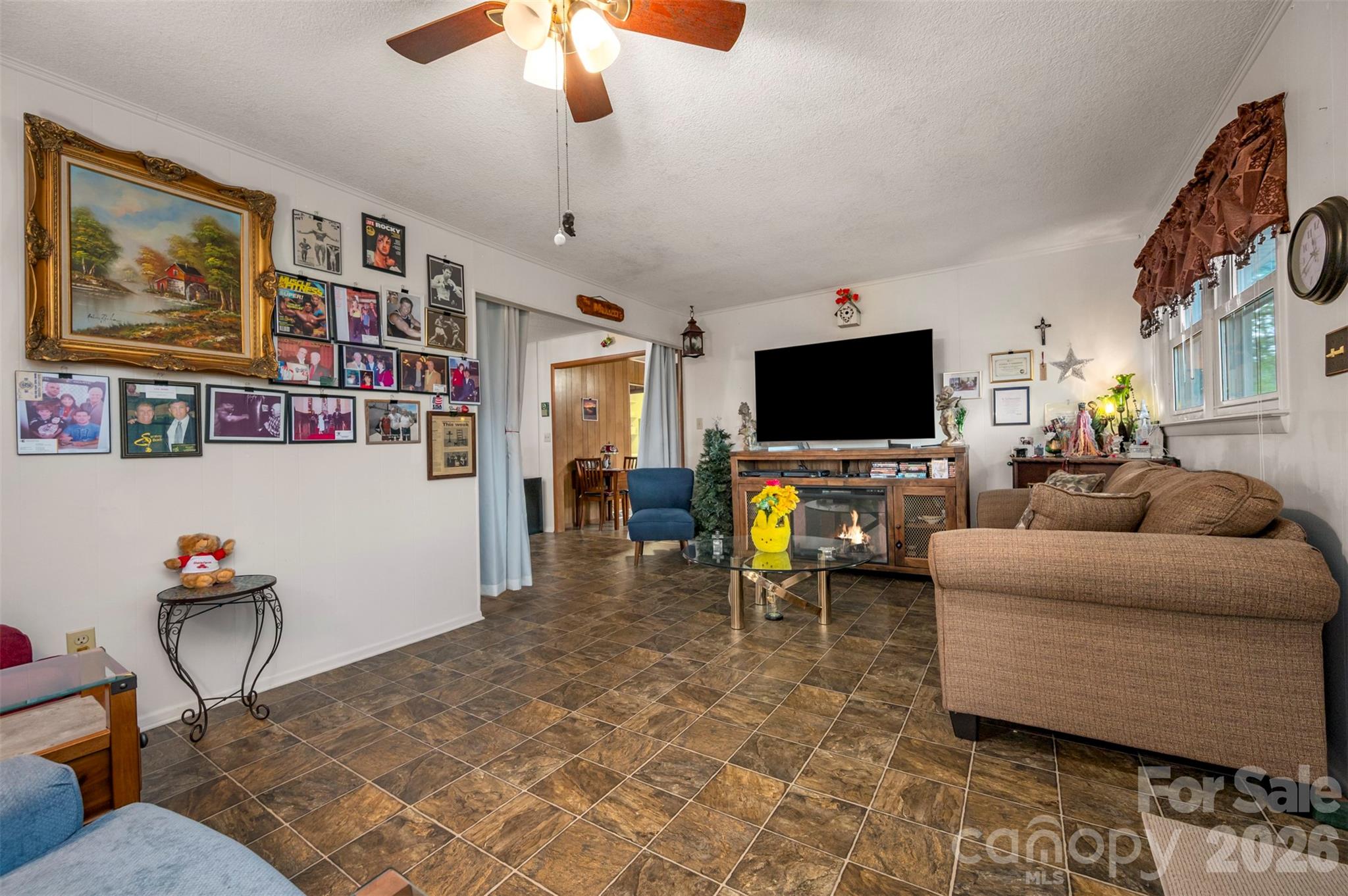 4665 Highway 9 Mill Spring, NC 28756 - Photo 5 of 46 a living room with furniture and a flat screen tv