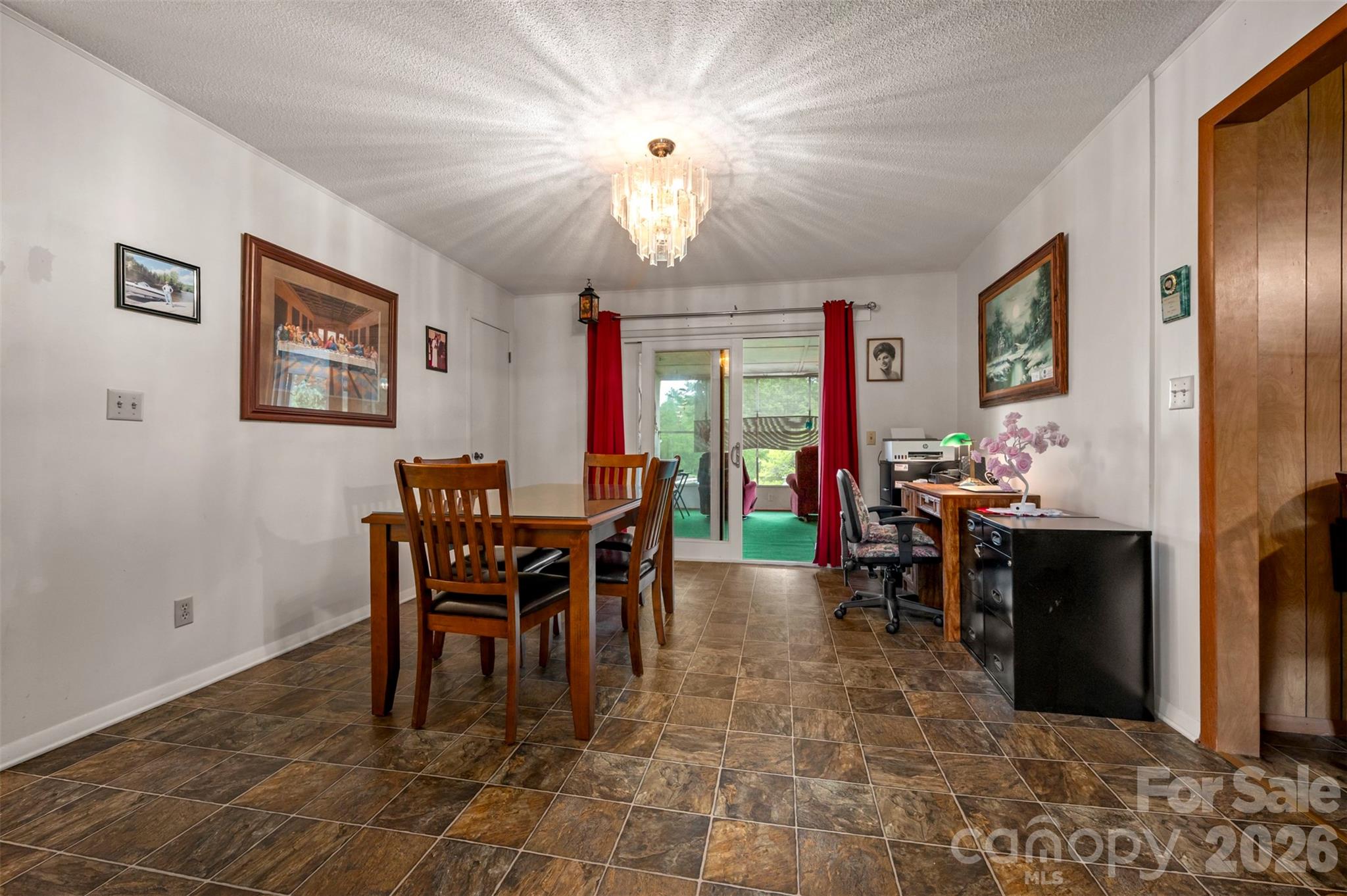 4665 Highway 9 Mill Spring, NC 28756 - Photo 6 of 46 a view of a dining room with furniture