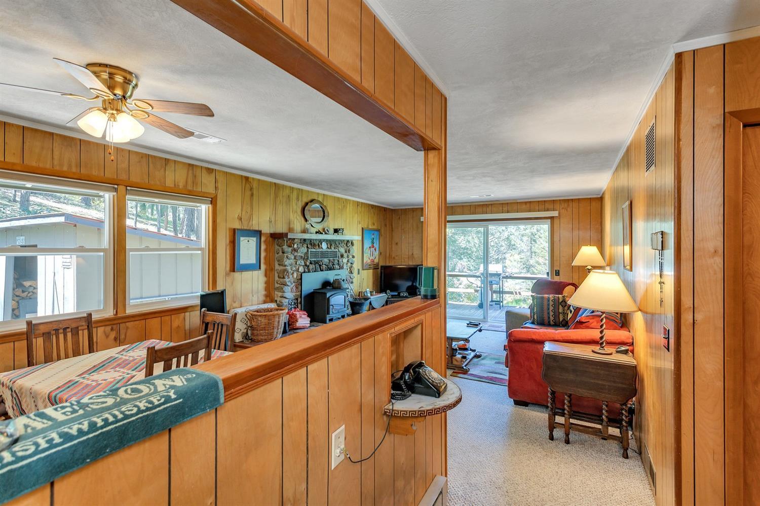 11851 Upper Applegate Road Jacksonville, OR 97530 - Photo 5 of 34 a room with furniture and a large window