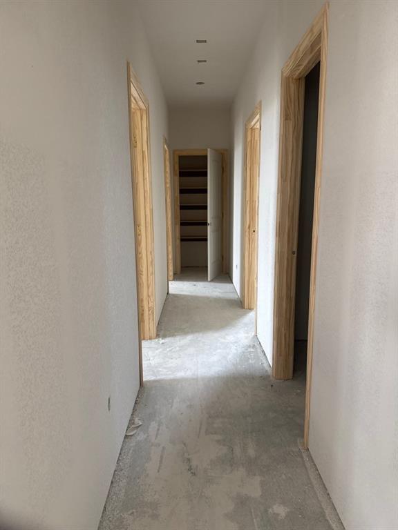 8813 County Road 623 Blue Ridge, TX 75424 - Photo 11 of 20 a view of a hallway with an empty room