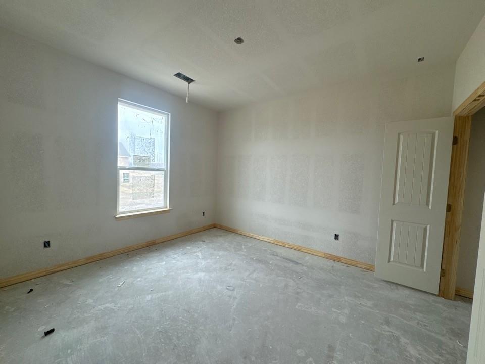 8813 County Road 623 Blue Ridge, TX 75424 - Photo 13 of 20 a view of an empty room with a window