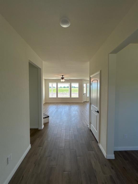 8813 County Road 623 Blue Ridge, TX 75424 - Photo 3 of 19 Entryway featuring wood-finish flooring extending into the main living space