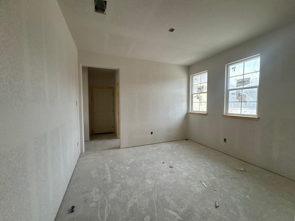 8813 County Road 623 Blue Ridge, TX 75424 - Photo 6 of 20 an empty room with windows