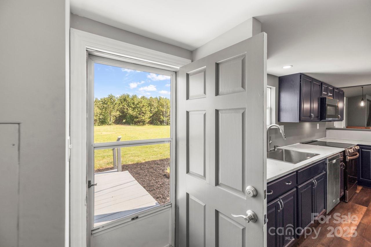 5354 Sherrills Ford Road Catawba, NC 28609 - Photo 12 of 44 a kitchen with a sink and large window