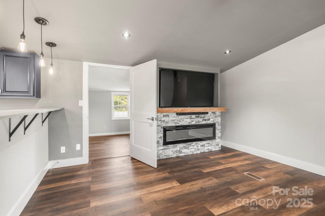 5354 Sherrills Ford Road Catawba, NC 28609 - Photo 17 of 44 a living room with furniture and a flat screen tv