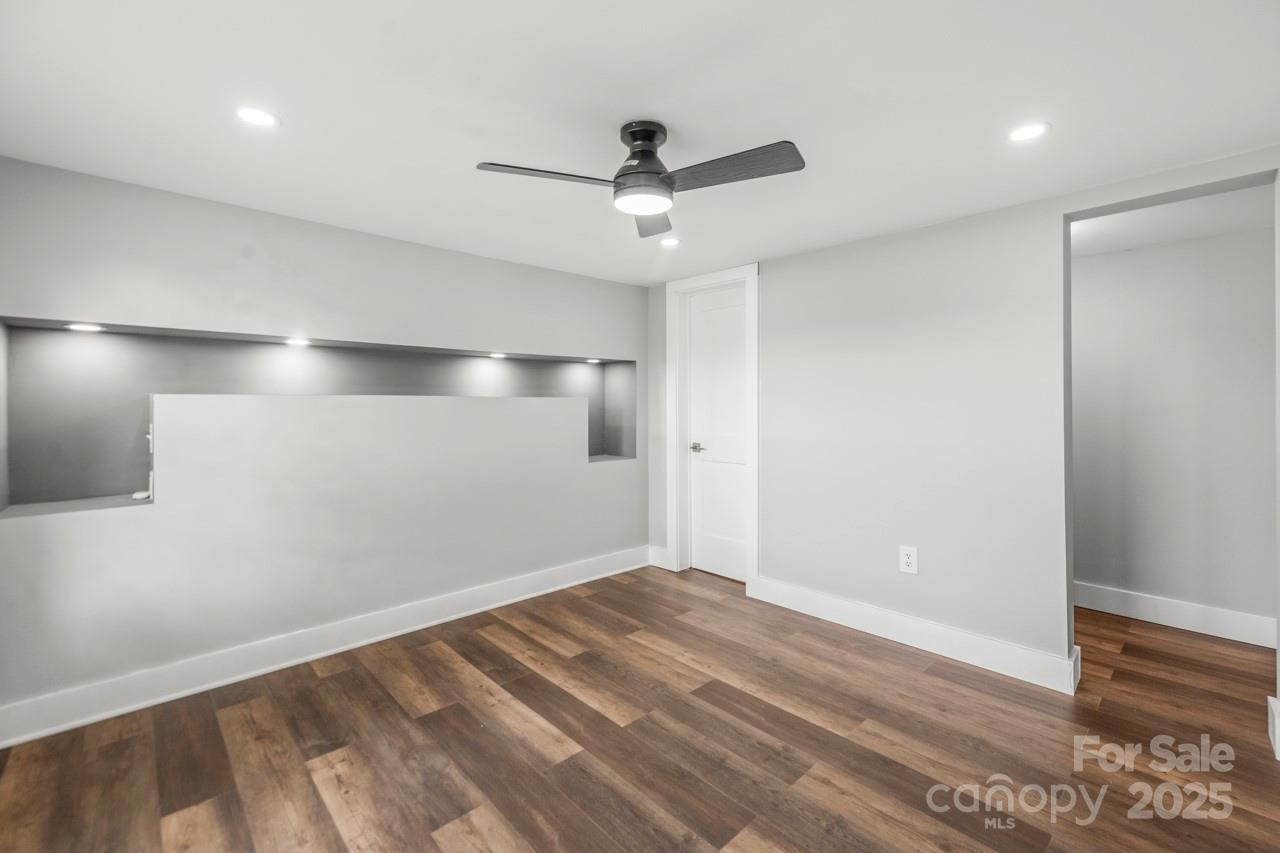 5354 Sherrills Ford Road Catawba, NC 28609 - Photo 19 of 44 a view of empty room with wooden floor
