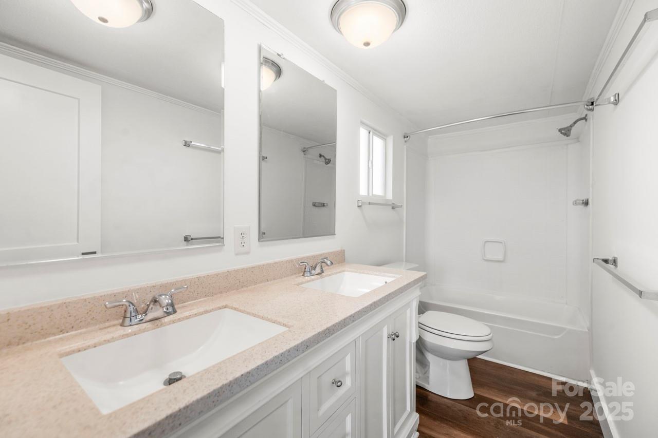 5354 Sherrills Ford Road Catawba, NC 28609 - Photo 23 of 44 a bathroom with a sink toilet double vanity and tub