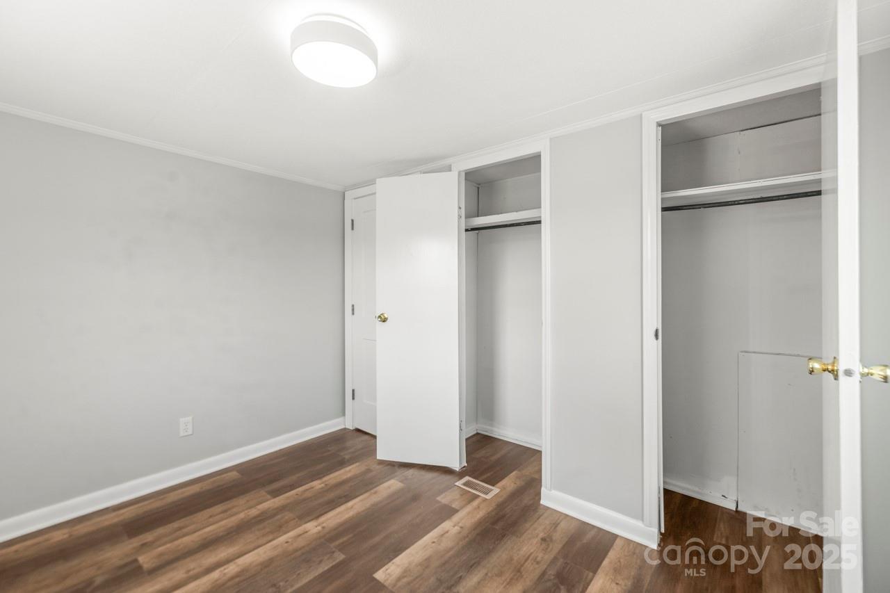 5354 Sherrills Ford Road Catawba, NC 28609 - Photo 28 of 44 a view of empty room with wooden floor