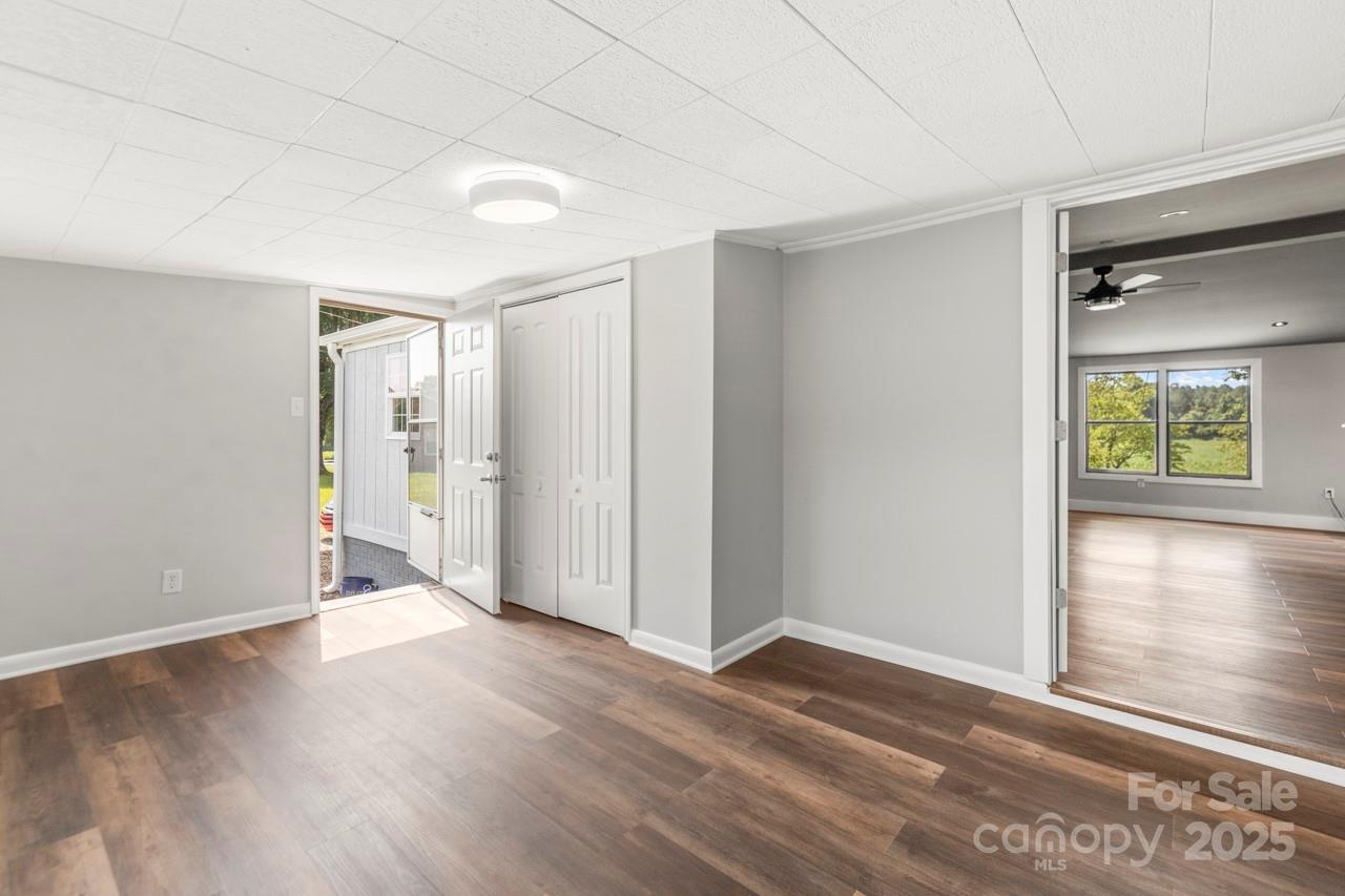 5354 Sherrills Ford Road Catawba, NC 28609 - Photo 31 of 44 wooden floor in an empty room with a window