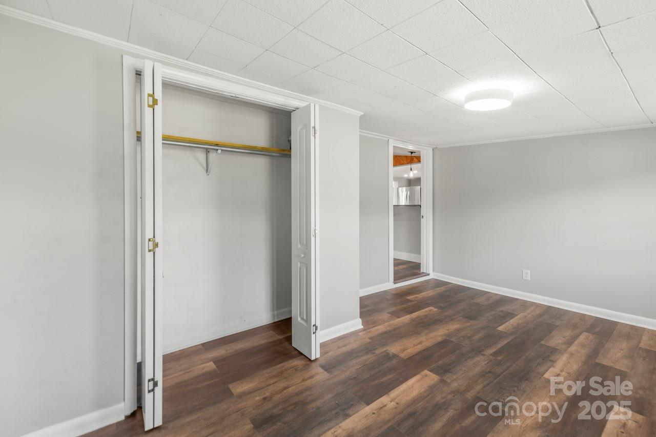 5354 Sherrills Ford Road Catawba, NC 28609 - Photo 32 of 44 an empty room with wooden floor and closet