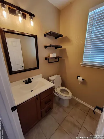 a view of a backyard with chairs