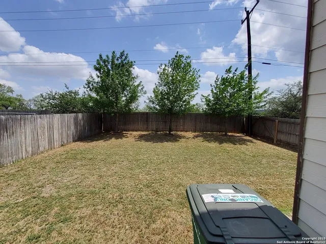 a house with trees in front of it
