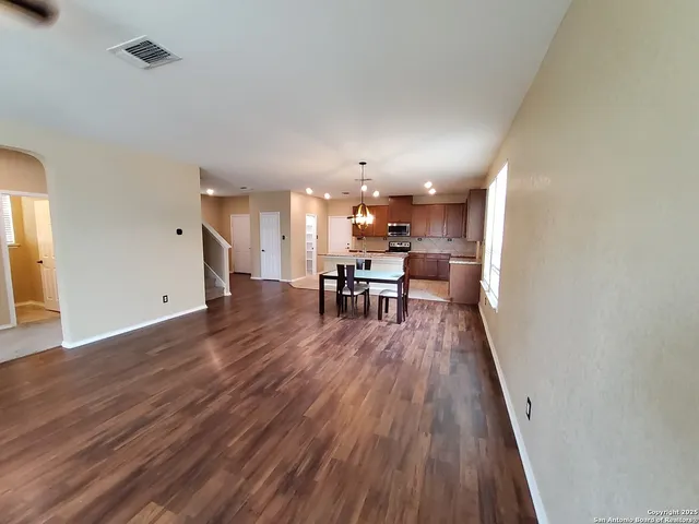a view of a kitchen and dining room