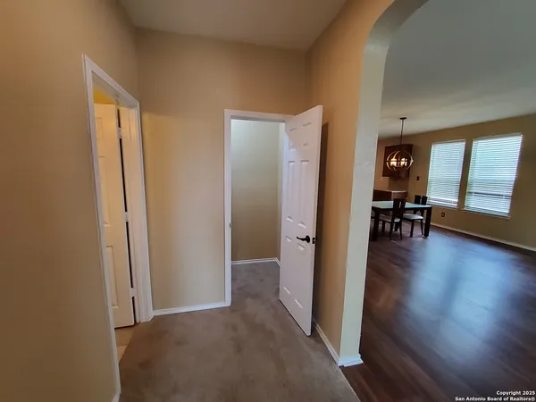 a view of a livingroom from a hallway