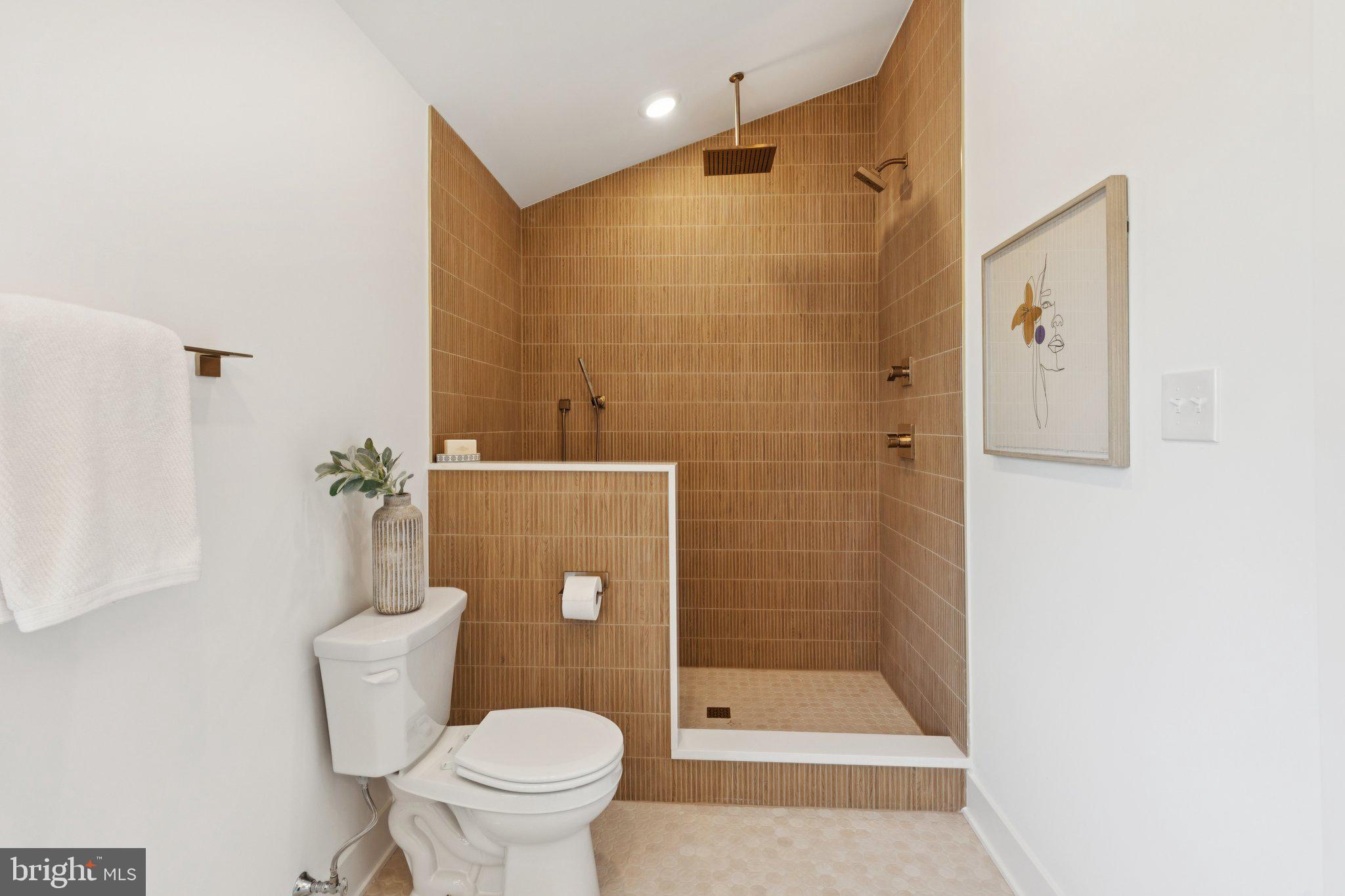 3697 Calumet Street Philadelphia, PA 19129 - Photo 16 of 34 a bathroom with a toilet and a shower