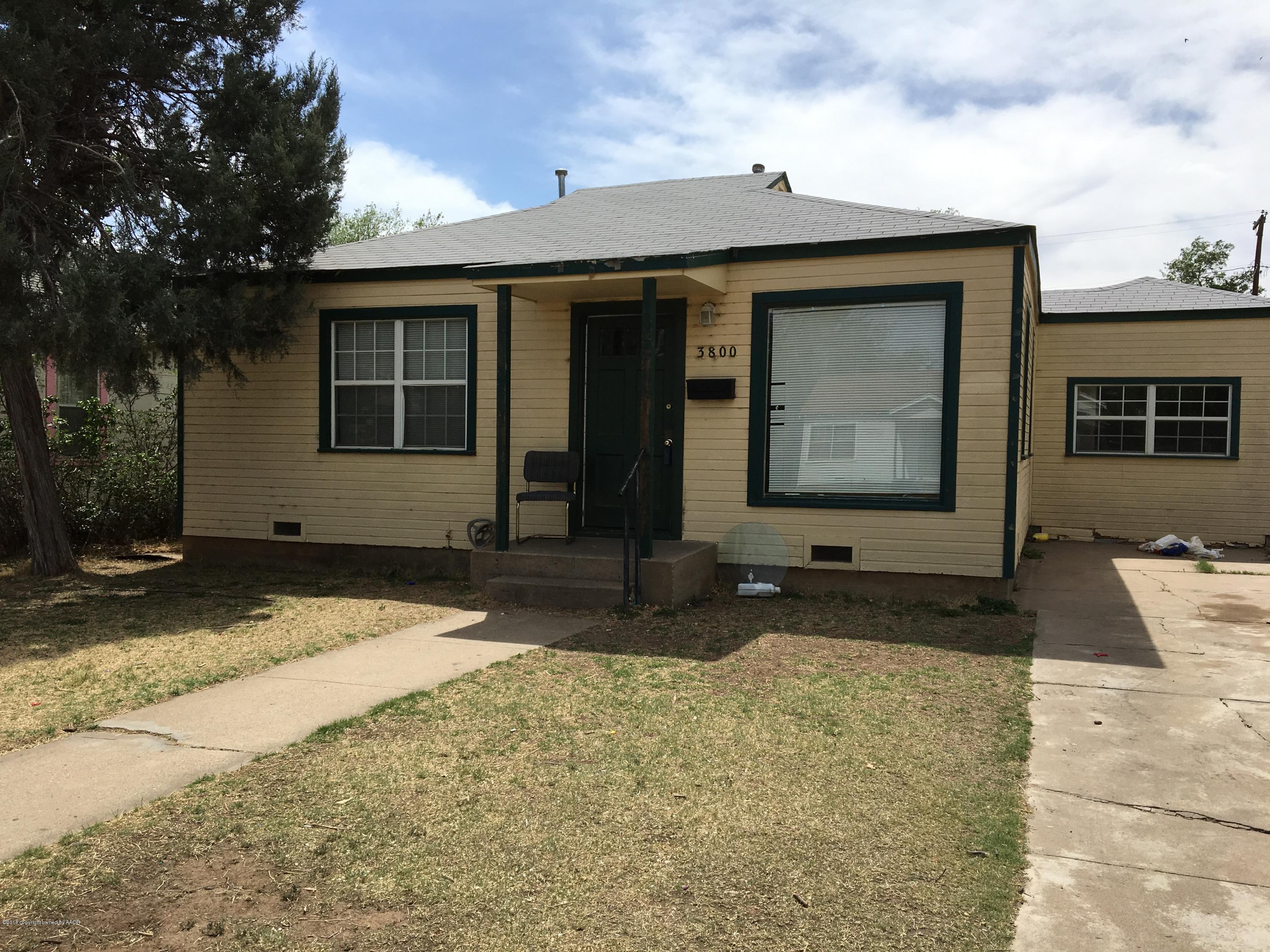 3800 South Tyler Street Amarillo, TX 79110 - Photo 1 of 5 a front view of a house with garden
