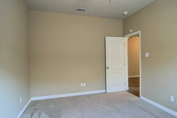 an empty room with closet