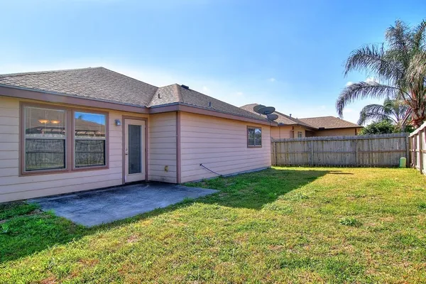 a view of a backyard with a garden
