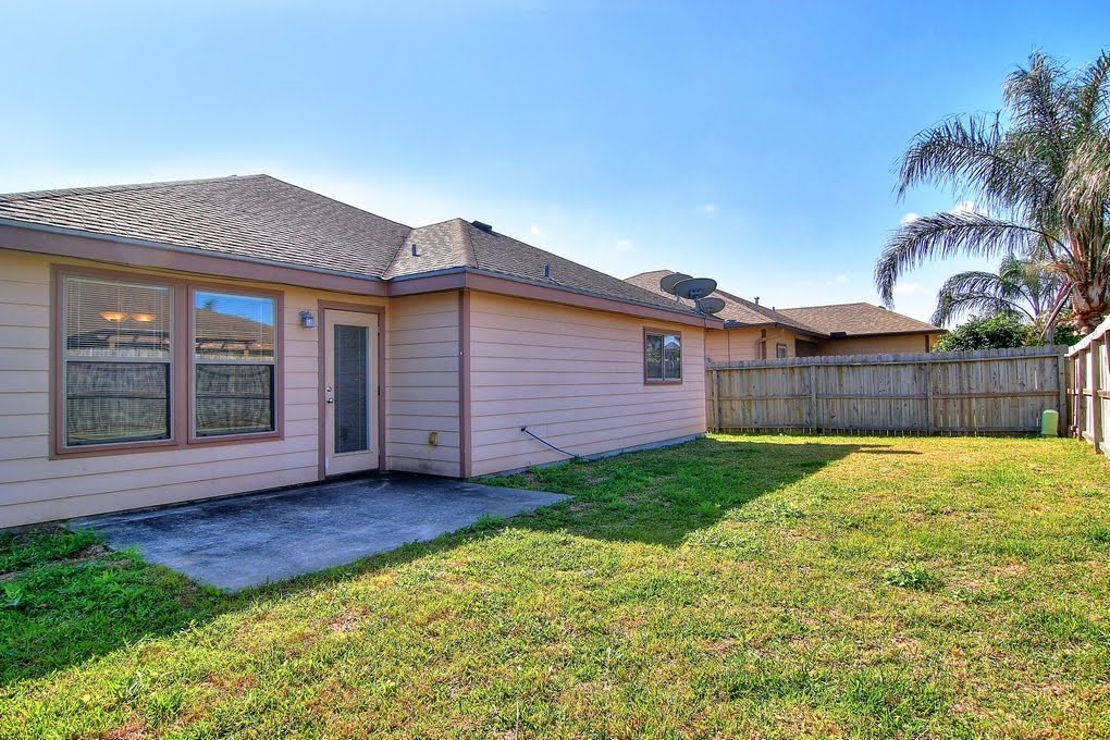 6824 Fox Tail Drive Corpus Christi, TX 78413 - Photo 32 of 40 a view of a backyard with a garden