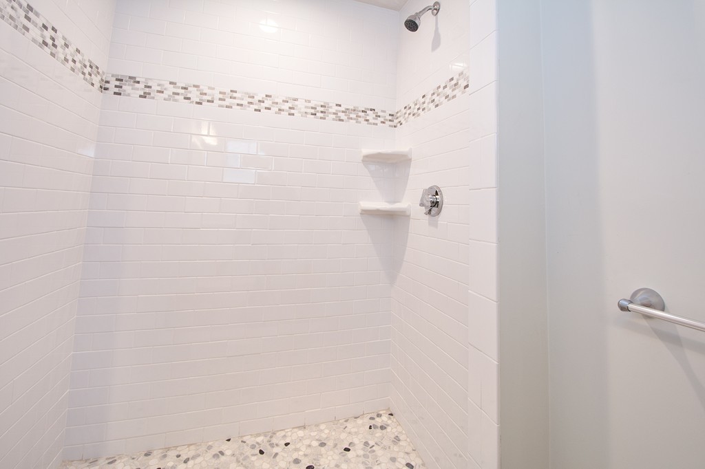 95 First Parish Road, Unit 1 Scituate, MA 02066 - Photo 22 of 24 a bathroom with a shower