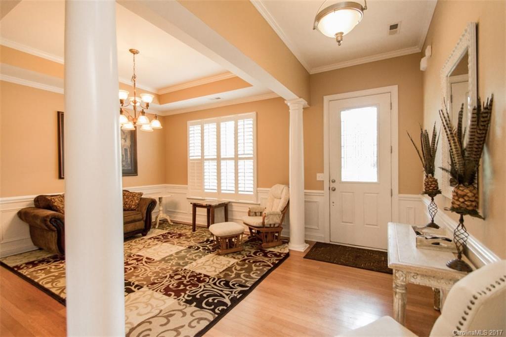 938 Treasure Court Fort Mill, SC 29708 - Photo 2 of 24 a living room with furniture and a flat screen tv