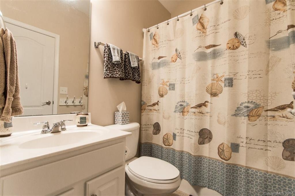 938 Treasure Court Fort Mill, SC 29708 - Photo 15 of 24 a bathroom with a sink toilet vanity and shower